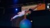 Circus artists in Cambodia attempt to break the Guinness World Record for the longest performance. (Photo by Scott Sharick)