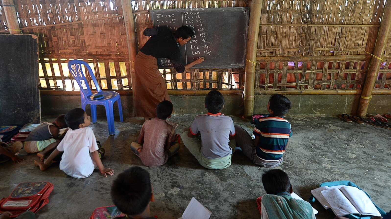 Rohingya refugee children study in a school at Kutupalong refugee camp, in Ukhia on Oct. 5, 2020.