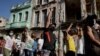 Personas gritan consignas contra el gobierno durante una protesta contra y en apoyo del gobierno, en medio del brote de la enfermedad por coronavirus, en La Habana, Cuba, el 11 de julio de 2021.