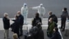 WHO Experts Arrive in China to Probe Pandemic’s Origins