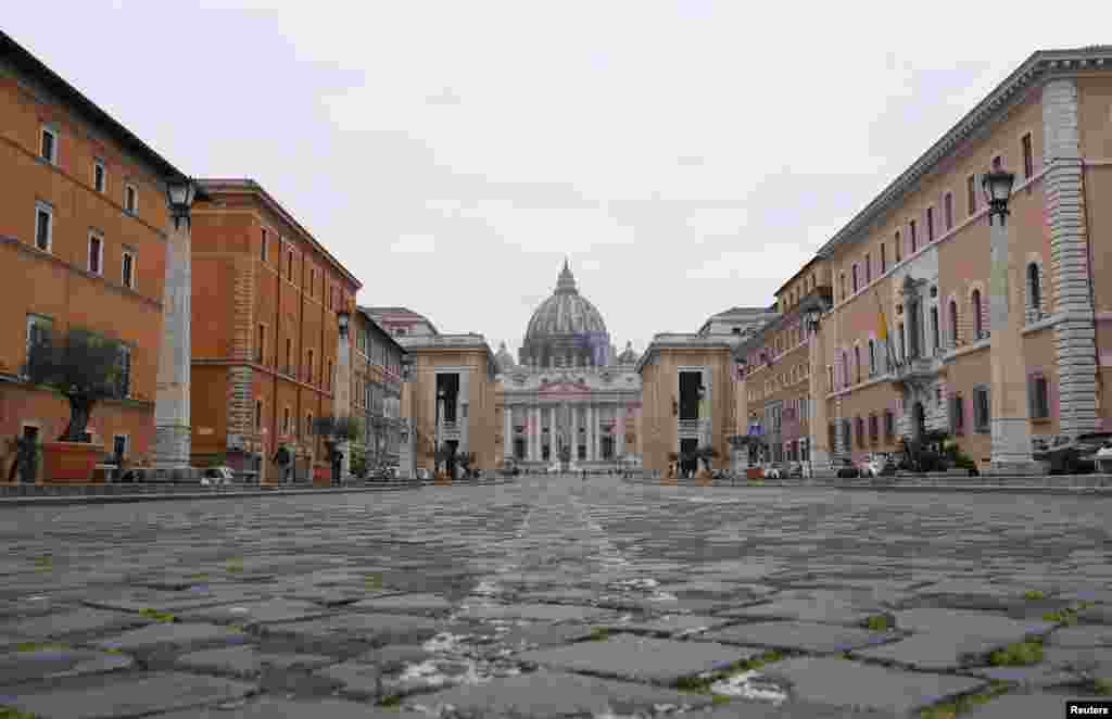 A view of St. Peter's Square, on the fourth day of an unprecedented lockdown across of all Italy imposed to slow the outbreak of coronavirus, as seen from Rome, Italy.