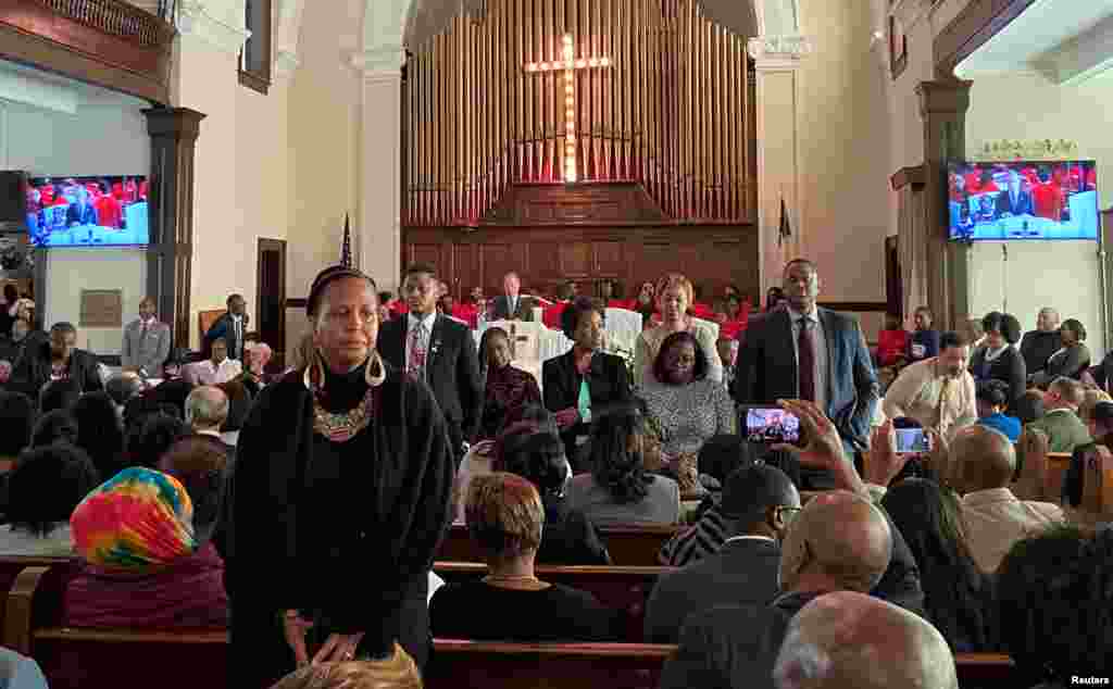 Attendees turn their backs on Democratic U.S. presidential candidate Michael Bloomberg as he talks about his plans to help the black community during a commemoration ceremony for the 55th anniversary of the "Bloody Sunday" march in the Brown AME Church in Selma, Alabama, March 1, 2020.