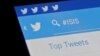 FILE - The Islamic State hashtag (#ISIS) is seen typed into the Twitter application on a smartphone in this picture illustration taken in Zenica, Bosnia and Herzegovina.