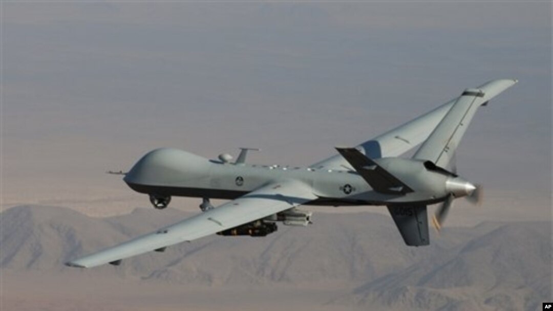 FILE - A U.S. Reaper drone patrols the skies in southern Afghanistan near the frontier with Pakistan.