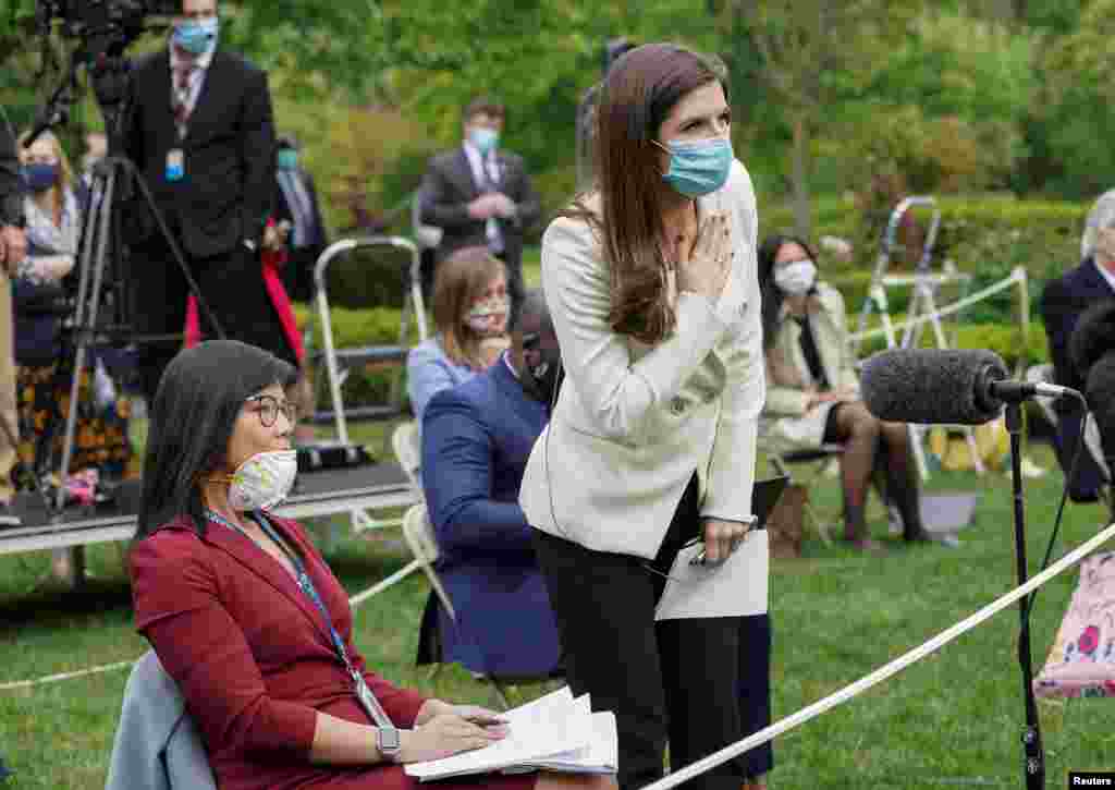 CNN White House correspondent Kaitlan Collins tries to ask her question of U.S. President Donald Trump after he called on her on the heels of an exchange with CBS News correspondent Weijia Jiang (L) during a coronavirus disease (COVID-19) outbreak response briefing at the White House in Washington, May 11, 2020. The president refused to hear Collins' question, then ended and left the news conference.