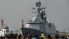 Journalists wait for the arrival of Chinese guided-missile frigate Wuhu at the international port in Manila on Jan. 17, 2019.