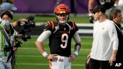 Cincinnati Bengals quarterback Joe Burrow (9) warms up before the NFL Super Bowl 56 football game between the Los Angeles Rams and the Cincinnati Bengals Sunday, Feb. 13, 2022, in Inglewood, California.