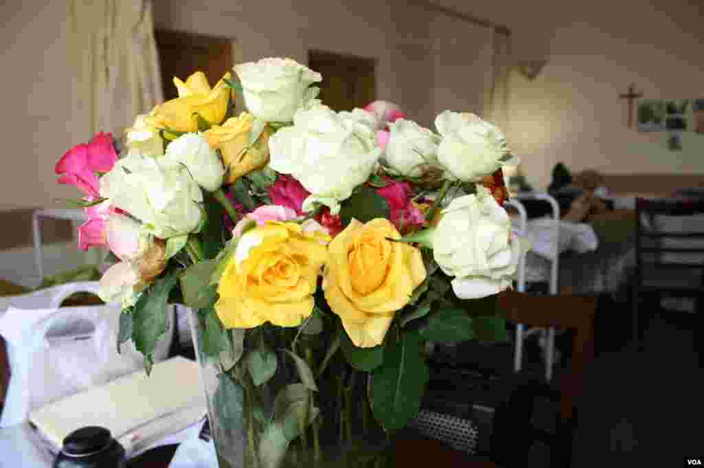 Roses brighten Cunnington’s room at Wits Hospice and fill the air with a sweet scent. He wakes in the morning to the sounds of children laughing. (Photo by Darren Taylor)