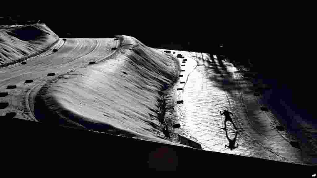 An athlete warms up for the Nordic Combined World Cup Men's Individual Gundersen NH/5km competition in Seefeld, Austria.