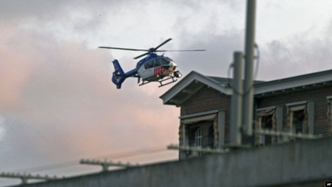 A helicopter believed to be carrying wanted war crime suspect Ratko Mladic enters the Scheveningen prison in The Hague, May 31, 2011