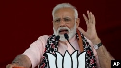 FILE - Indian Prime Minister Narendra Modi speaks during an election campaign rally of his Bharatiya Janata Party in Hyderabad, India, April 1, 2019.