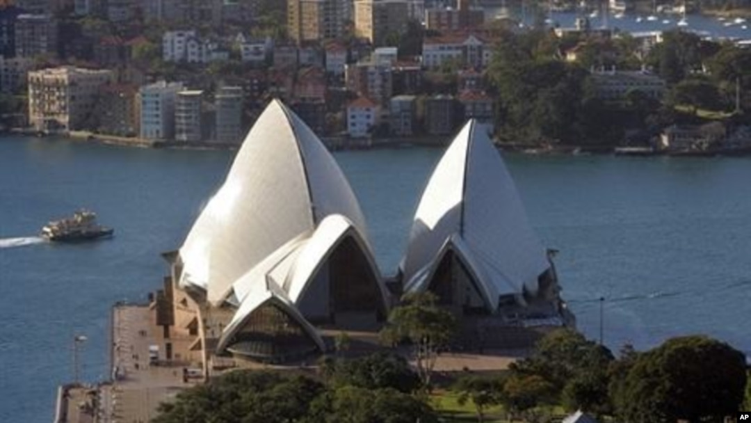 This recent photo shows Sydney's famous landmark, the Sydney Opera House (C), with the Royal Botanic Gardens and Government House (below).