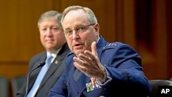 The Senate Armed Services Committee hears from top officials of the Air Force, Air Force Chief of Staff Gen. Mark A. Welsh III, (r) and Secretary of the Air Force Michael B. Donley, during a hearing on Capitol Hill in Washington, May 7, 2013.