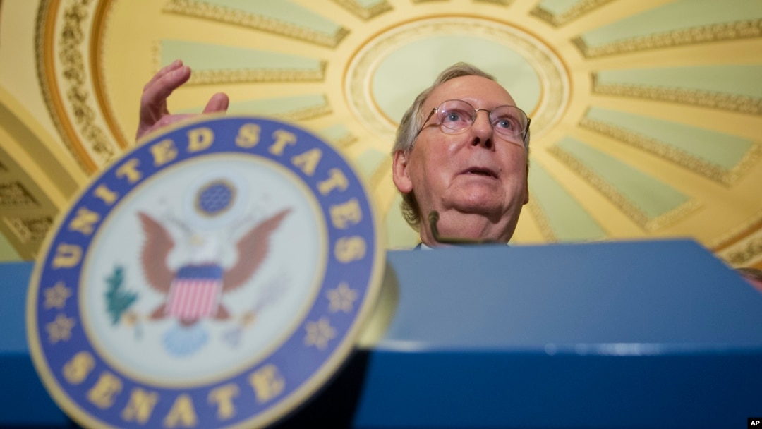 FILE - Senate Majority Leader Mitch McConnell of Kentucky speaks during a news conference on Capitol Hill in Washington, July 12, 2016. In the wake of the Florida school shooting on Feb. 14, 2018, McConnell so far has held back on bringing to the floor for debate and a vote a bill to strengthen a national background check system for gun ownership.