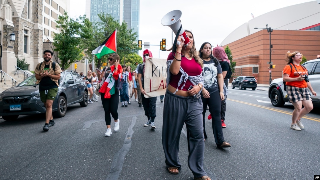 Alia Amanpour Trapp, center, leads the crowd during a pro-Palestine rally and march on Temple University campus in Philadelphia, Pennsylvania, Aug. 29, 2024. 
