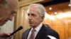 Senator Bob Corker (R-TN) speaks with reporters after a vote on Capitol Hill in Washington December 17, 2012.
