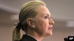 Secretary of State Hillary Rodham Clinton says the United States must continue sending diplomats and aid workers to the Arab world's emerging democracies, despite last month's deadly attack in Libya, Oct. 12, 2012. 