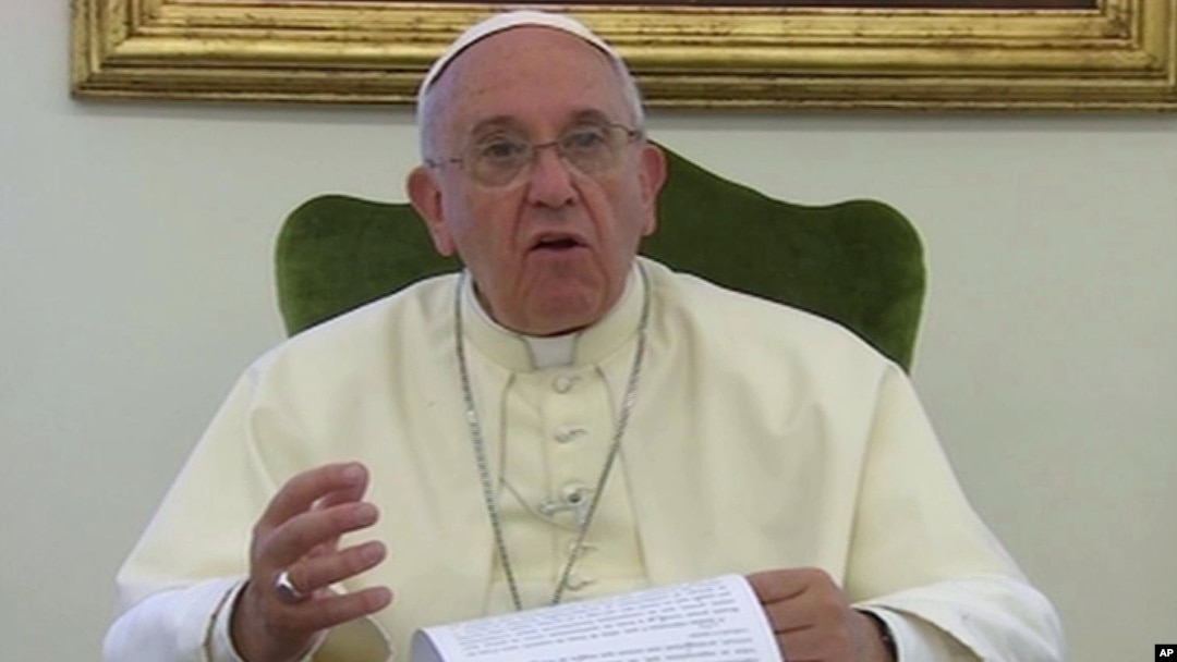 Pope Francis gives a recorded message for the soccer World Cup: 'Let football be a showcase for teamwork and solidarity, not an exhibition of racism and greed,' June 12, 2014.