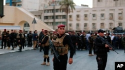 Iraqi security forces close a bridge leading to the heavily guarded Green Zone during protests demanding services and jobs in central Baghdad, Iraq, July 14, 2018.