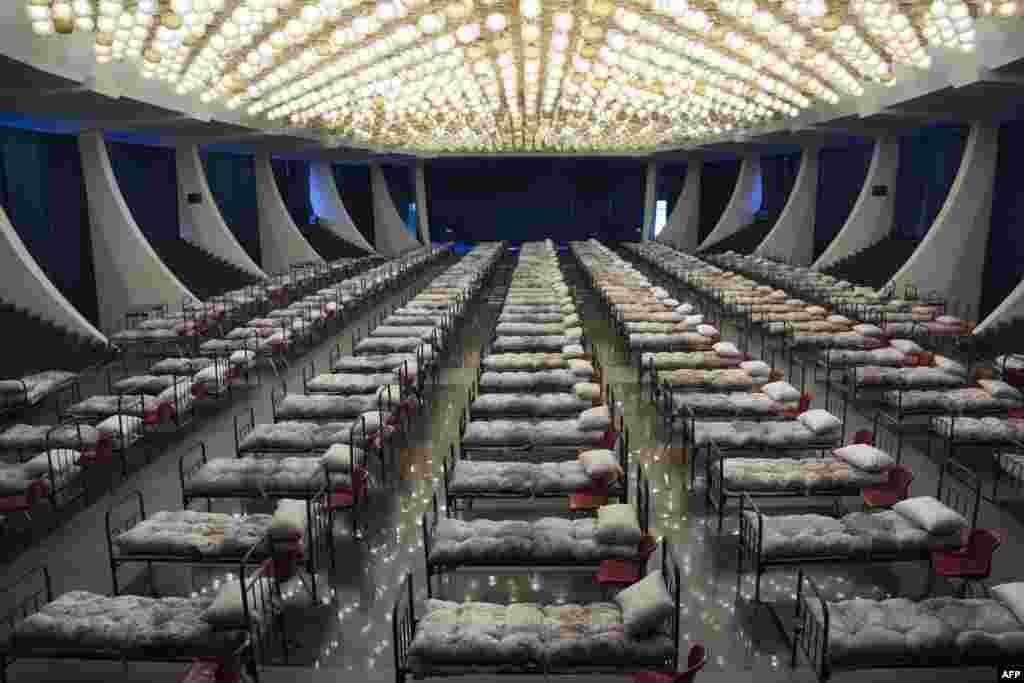Beds are lined up in the hall of a temporary hospital during a partial lockdown amid the COVID-19 outbreak caused by the novel coronavirus, in the Karen Demirchyan's Sports and Concert Complex, in Yerevan, Armenia.