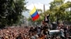 Мадуро и Гуайдо проводят первомайские демонстрации в Венесуэле 