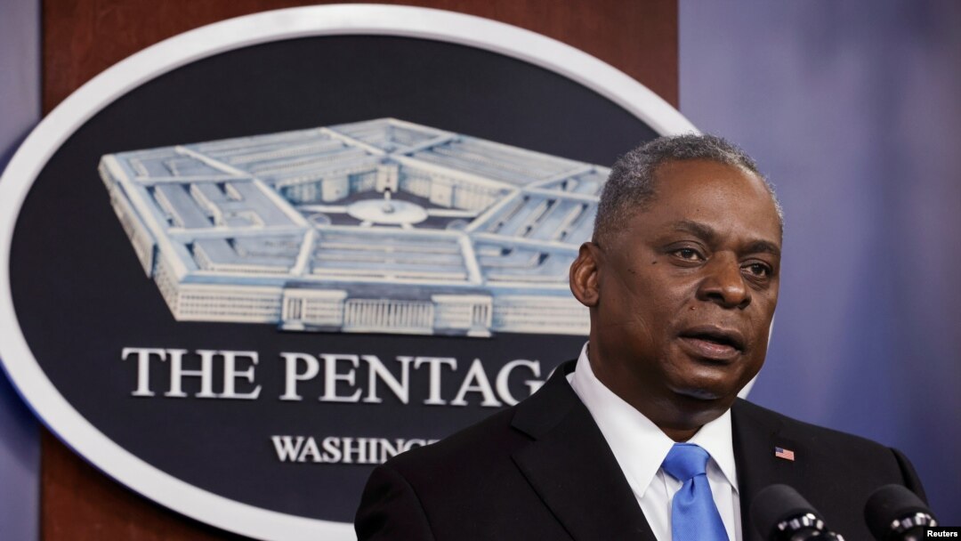 FILE - U.S. Defense Secretary Lloyd Austin speaks to Defense Department personnel at the Pentagon in Arlington, Virginia, Feb. 10, 2021..