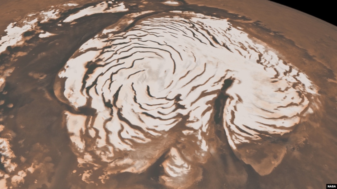 This image from two instruments aboard NASA’s Mars Global Surveyor, depicts an orbital view of the north polar region of Mars. New findings from the Mars Reconnaissance Orbiter have revealed subsurface geology in this region.