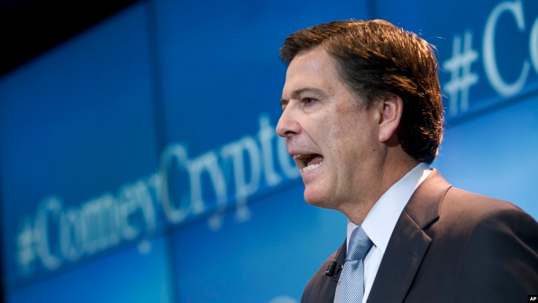 FBI Director James Comey warns of the impact of smart phone data encryption on law enforcement, Oct. 16, 2014, at Brookings Institution in Washington. 