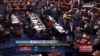 This frame grab from video provided by C-SPAN2, shows the floor of the Senate on Capitol Hill in Washington, Sept. 28, 2016, as the Senate acted decisively to override President Barack Obama's veto of Sept. 11 legislation.