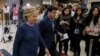 U.S. Democratic presidential nominee Hillary Clinton leaves after an unscheduled news conference on FBI inquiries about her emails after a campaign rally in Des Moines, Iowa, Oct. 28, 2016. 
