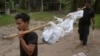 Dozens of Bodies Found in Thai Human Smuggling Camp
