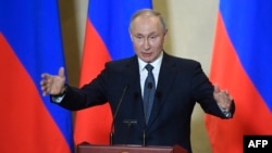 Russian President Vladimir Putin gives a speech in Sevastopol, in Russia-annexed Crimea, March 18, 2020. 