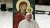 Pope Francis walks past an icon of the Virgin and the Christ-child during an audience with pilgrims at the Vatican, Oct. 6, 2018.