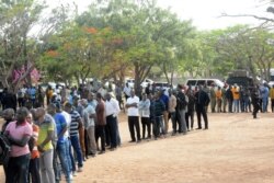 FILE - Residents lineup to cast their vote in Dodoma, Tanzania, Oct. 28, 2020.