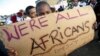 Migrants in Cape Town's Mannenberg community demonstrate against xenophobia. (UTERS/Mike Hutchings)