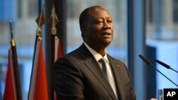 FILE - Ivory Coast's President Alassane Ouattara speaks in Berlin, Germany, Nov. 19, 2019.
