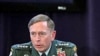 Gen. David Petraeus, top US and NATO commander (L), and Ambassador Mark Sedwill, NATO Senior Civilian Rep. in Afghanistan address discuss 'The International Mission in Afghanistan' at the United Services Institute in London, 15 Oct 2010