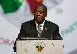 FILE - Angola's Vice President Manuel Vicente addresses a session during the India Africa Forum Summit in New Delhi, India, Oct. 29, 2015.