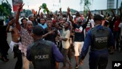 Residents celebrate in Kinshasa, Jan. 10, 2019, after learning that opposition presidential candidate Felix Tshisekedi has been declared the winner of the elections. 