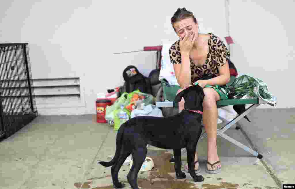 Terralyn Lehman recalls fleeing the Erskine Fire as she sits outside an evacuation center at Kernville Elementary School in Kernville, California, June 26, 2016.