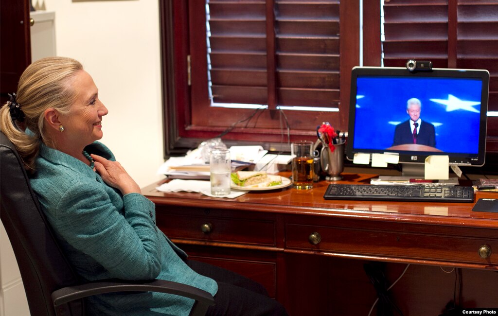 U.S. Secretary of State Hillary Clinton watching a replay of former president Bill Clinton's speech at the Democratic National Convention, September 6, 2012.
