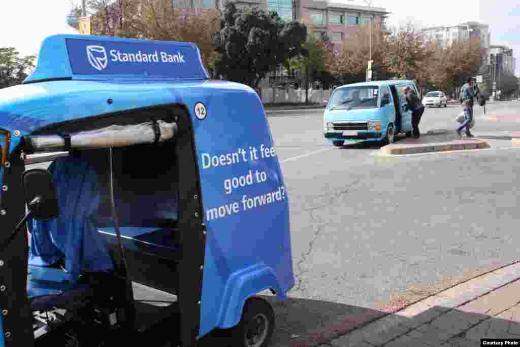 Johannesburg’s notorious minibuses don’t like stiff competition from the cheaper tuk tuks so the little ‘buzzing bees’ avoid turf battles by limiting their territory. (Photo by Darren Taylor)
